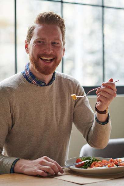 istock Young man enjoying healthy breakfast 928267062