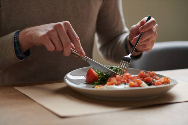 istock Young man enjoying healthy breakfast 928267292