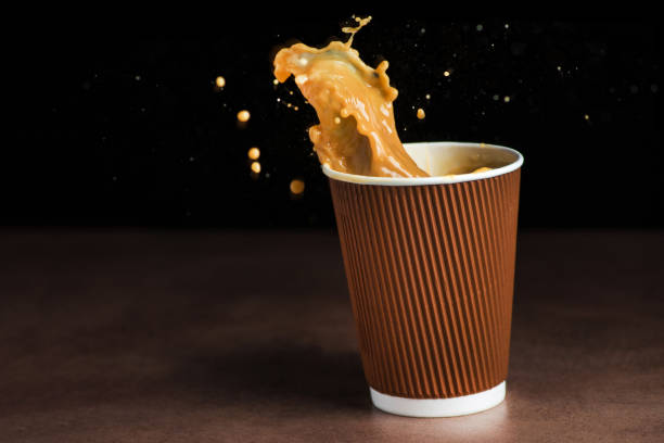 istock Splash of coffee in cup 928276290