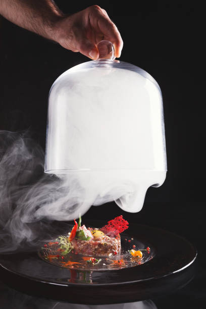 istock Modern restaurant dish. Veal tartare with quail egg closeup 928277204