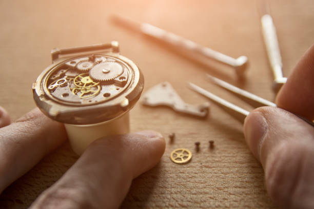 istock Process of installing a part on a mechanical watch, watch repair 928277354