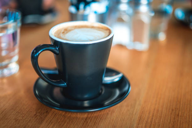 istock Coffee cup on a table in coffee shop 928287974