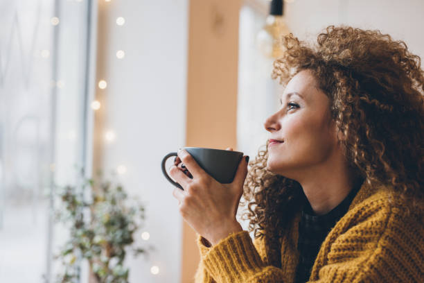 istock Pretty woman at the cafe 928299470
