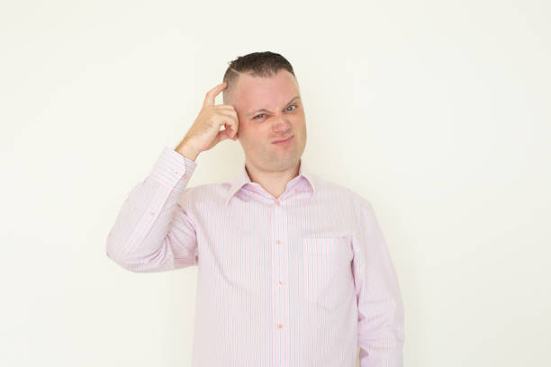 istock Displeased thoughtful man scratching head 928301282