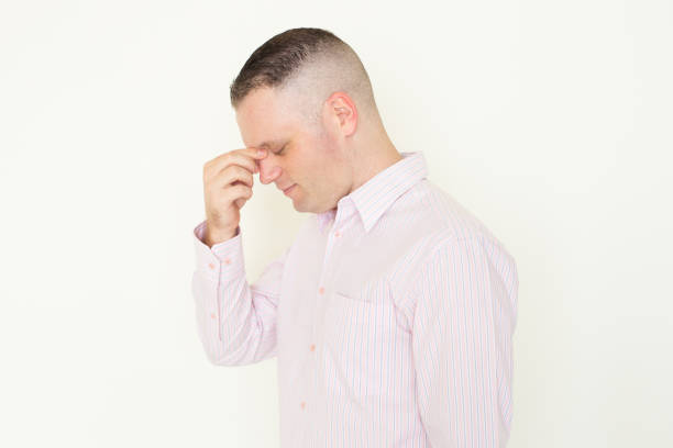 istock Frustrated businessman rubbing bridge of nose 928301342