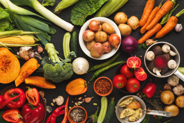 istock Colorful fresh organic vegetables background 928301780