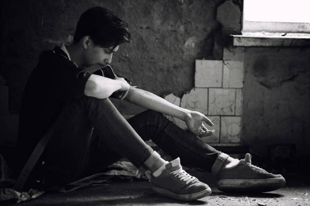 istock A young man takes drugs 928314768