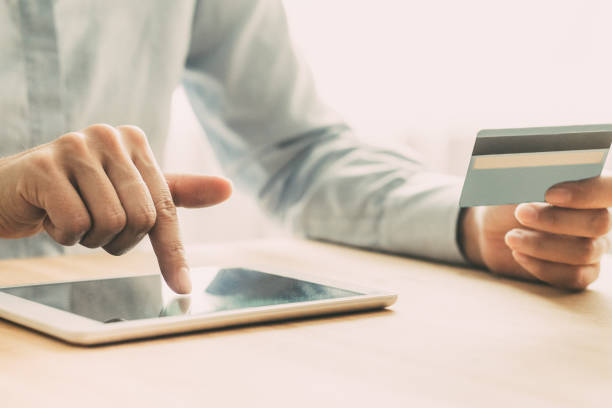 istock Closeup of Woman Using Tablet for Online Shopping 928320204