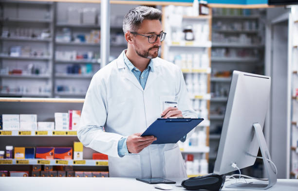 He's the one efficiently managing the pharmacy stock photo