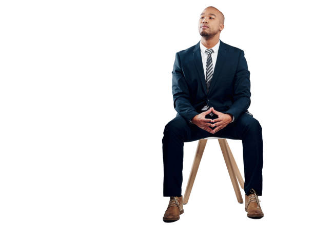 Studio shot of a handsome young businessman posing against a white background