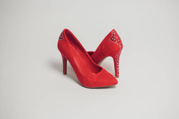 istock female high-heeled shoes isolated 928324848