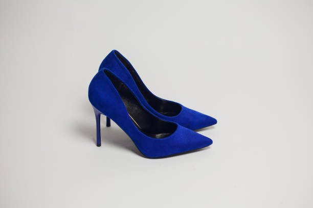 istock female high-heeled shoes isolated 928325214