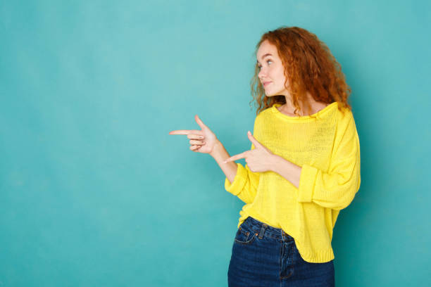 istock Young beautiful woman smiling and gesturing 928328486