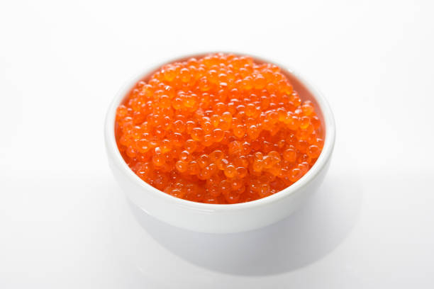istock Red caviar in a bowl isolated 928332092