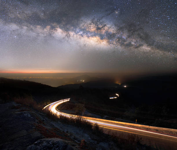 istock Milky way over the mountain, Thailand 928335414