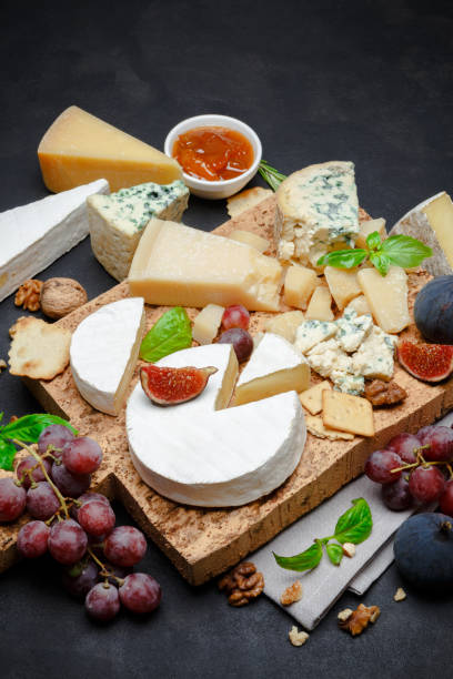 istock Various types of cheese - parmesan, brie, roquefort, cheddar 928343200