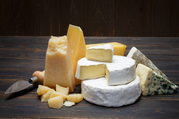 istock Various types of cheese - parmesan, brie, roquefort, cheddar 928343656