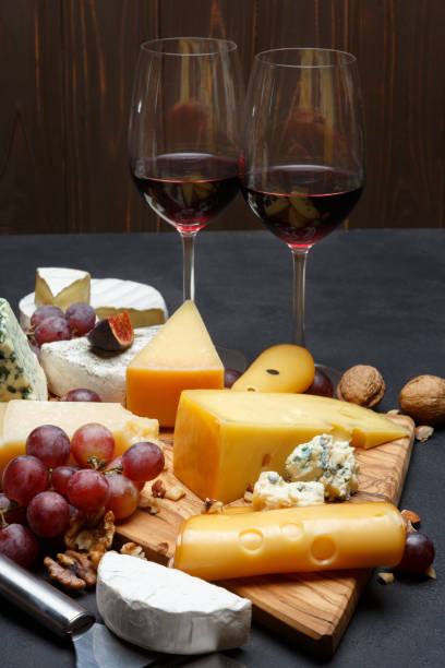 istock Wine and Various types of cheese - parmesan, brie, roquefort, cheddar 928344532
