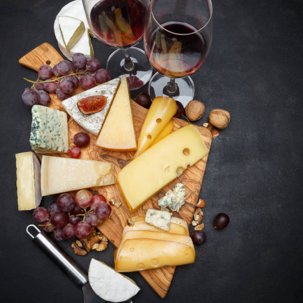 istock Wine and Various types of cheese - parmesan, brie, roquefort, cheddar 928344600