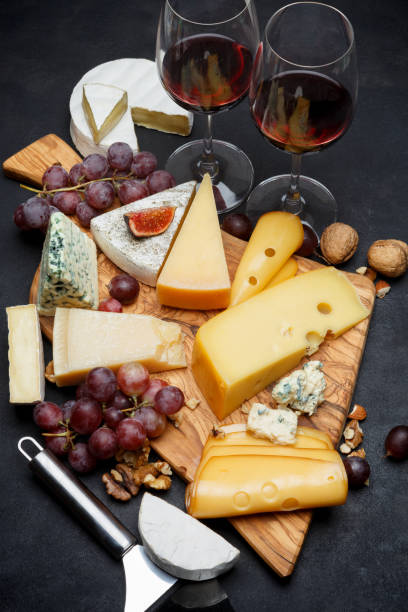 istock Wine and Various types of cheese - parmesan, brie, roquefort, cheddar 928346668