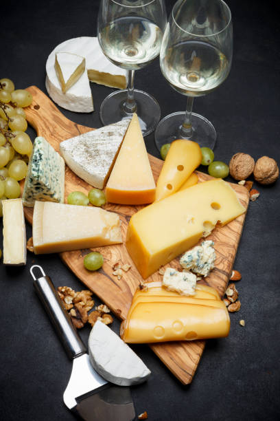 istock Wine and Various types of cheese - parmesan, brie, roquefort, cheddar 928346670
