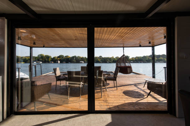 istock Terrace of log cabin on river 928346698