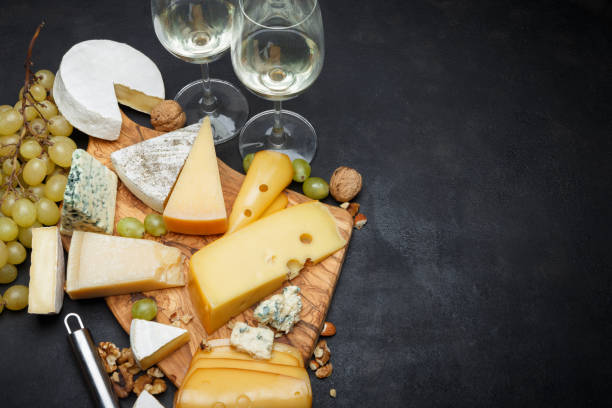 istock Wine and Various types of cheese - parmesan, brie, roquefort, cheddar 928346796