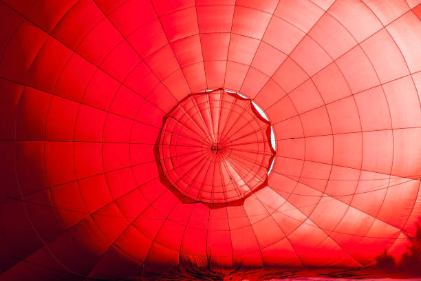 Inside a red hot air balloon in preparation