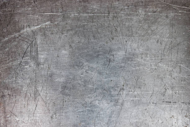 istock Old metal sheet background, brushed silver surface of iron 928348124