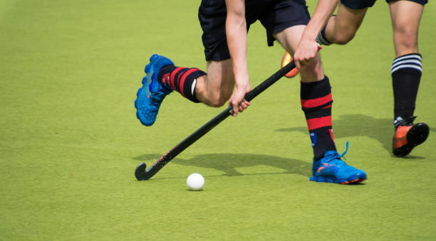 istock Low Section Of Men Playing Hockey 928352374