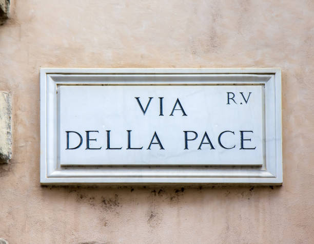 istock Street sign Via della Pace in Rome, Italy 928358752