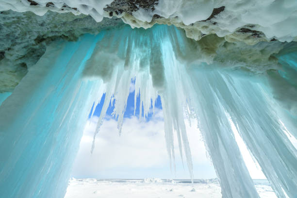 istock Icy cave with icicles, Sakhalin island, Russia. 928360300