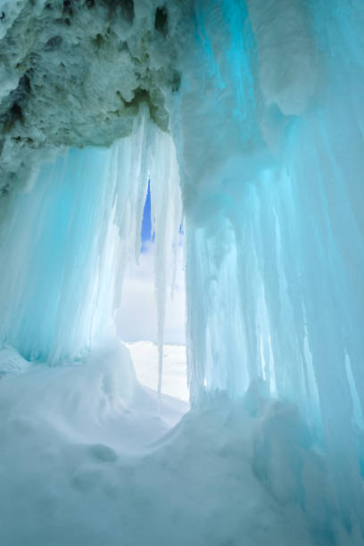 istock Icy cave with icicles, Sakhalin island, Russia. 928360374