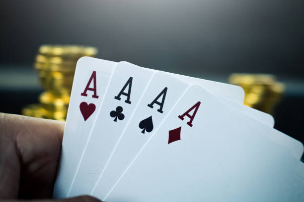 istock Close-Up Of Man Holding Cards 928363360