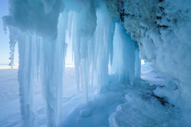 istock Icy cave with icicles, Sakhalin island, Russia. 928363436