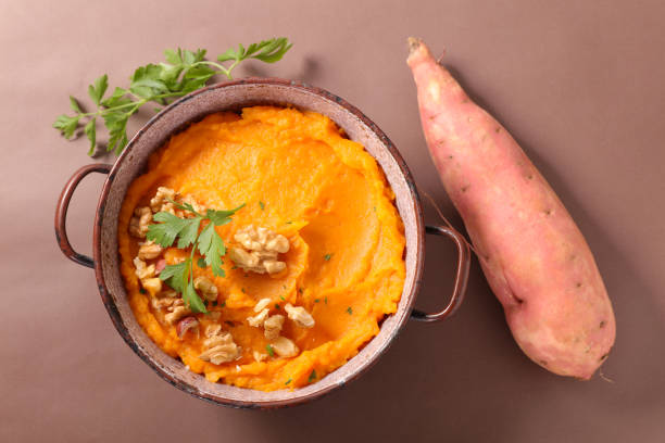 mashed sweet potato mashed sweet potato mashed stock pictures, royalty-free photos & images