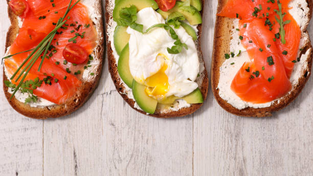 istock bruschetta, bread with salmon, avocado and poached egg 928368704