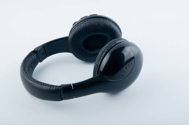 istock Modern black headphones white background 928368804