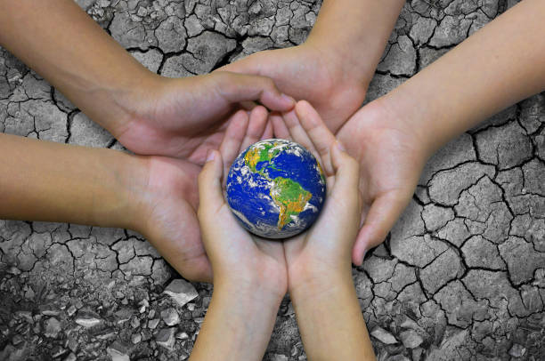istock Cropped Hands Holding Planet Earth 928369234