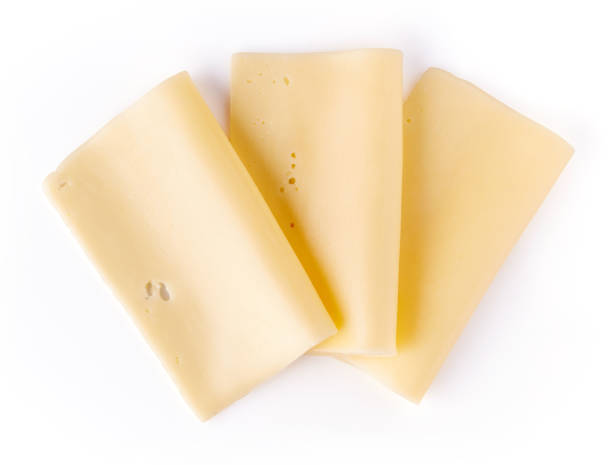 istock Sliced cheese isolated on white background, top view 928369850