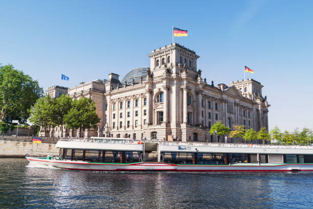 istock Excursion boat at River Spree in front of Reichstag, Berlin 928375148