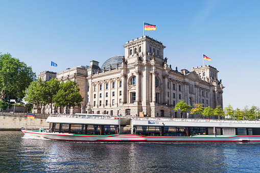 Excursion boat at River Spree in front of Reichstag, Berlin