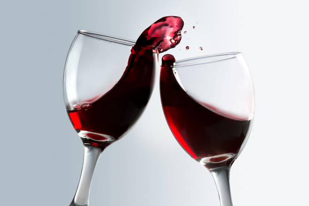 istock Toasting of two glasses of red wine 928376294
