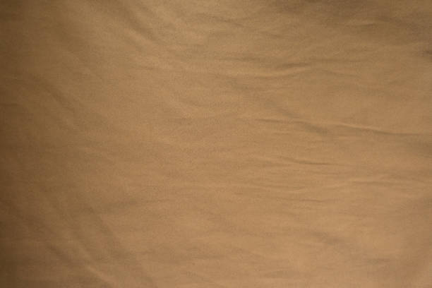 istock Top view of simple fulvous brown fabric 928376576
