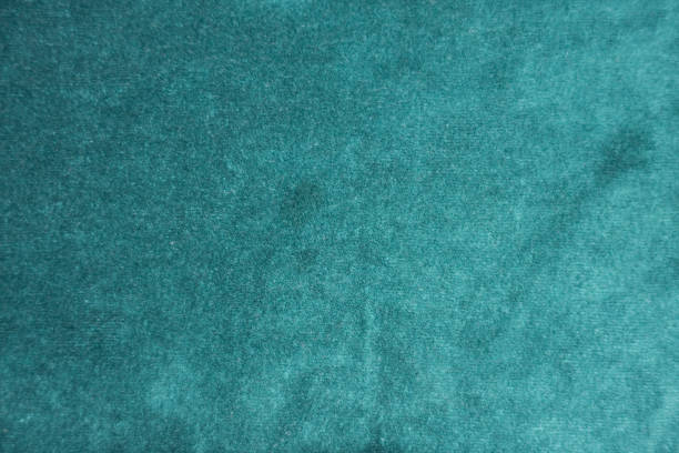 Surface of dark green napped fabric from above Surface of dark green napped fabric from above unprinted stock pictures, royalty-free photos & images