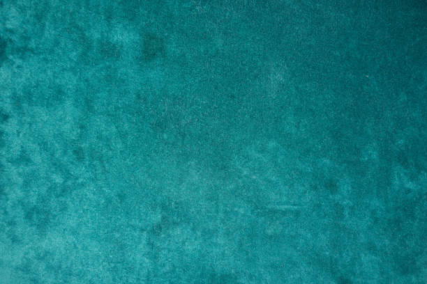 Top view of dark green velour fabric Top view of dark green velour fabric unprinted stock pictures, royalty-free photos & images