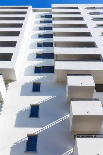istock Rows of balconies in modern white apartment building 928382386