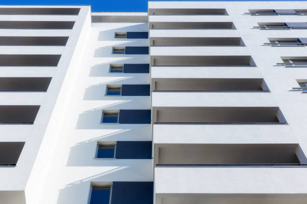 istock Rows of balconies in modern white apartment building 928382446