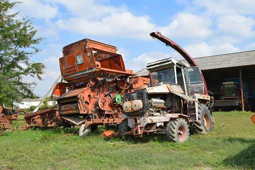 Old rusty disassembled combine harvester. Combine harvesters Agricultural machinery
