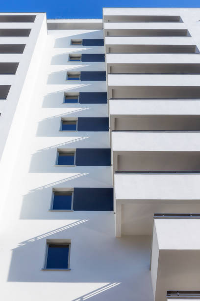 istock Rows of balconies in modern white apartment building 928382742